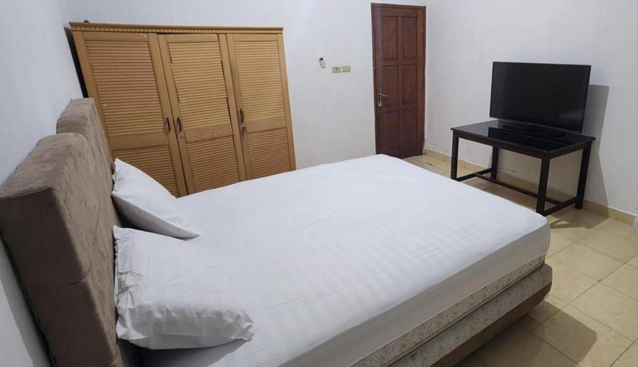 Permata Homestay Kotamobagu Mitra Reddoorz Esterno foto