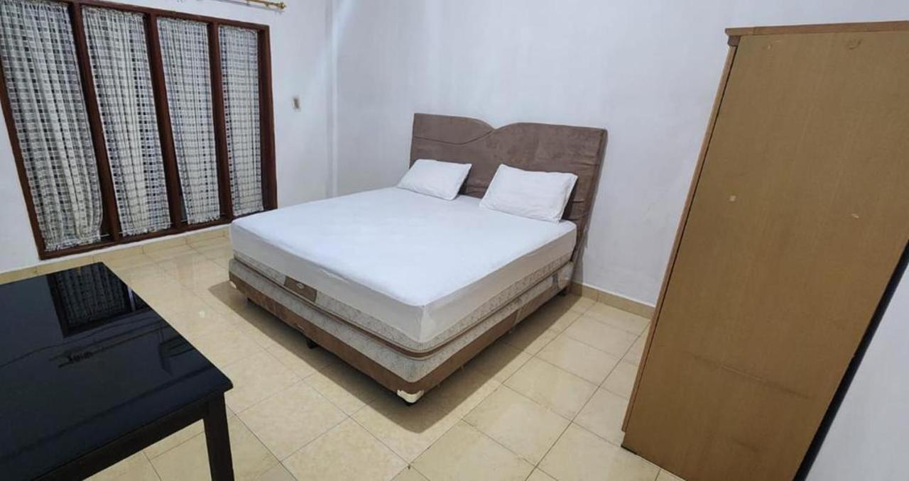 Permata Homestay Kotamobagu Mitra Reddoorz Esterno foto