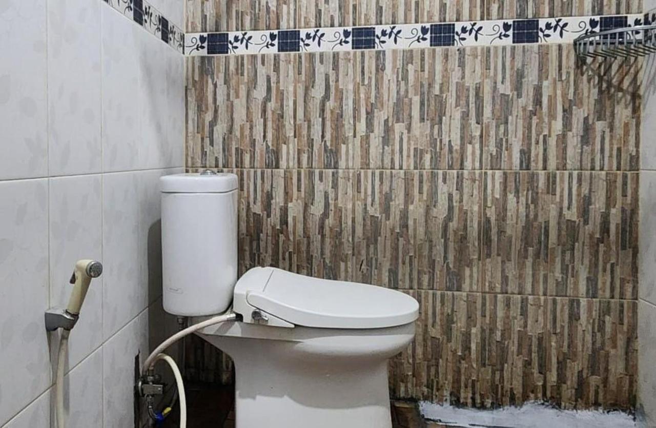 Permata Homestay Kotamobagu Mitra Reddoorz Esterno foto